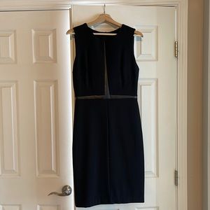 Black dress with leather details